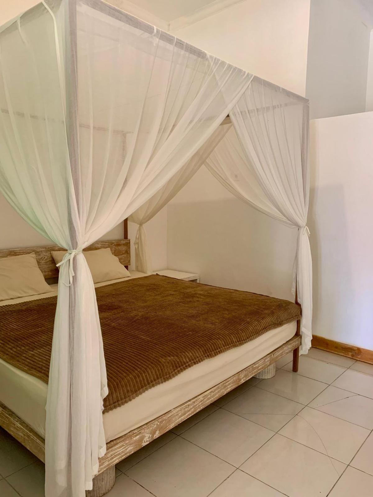 The Village Rua Beach Homestay Esterno foto
