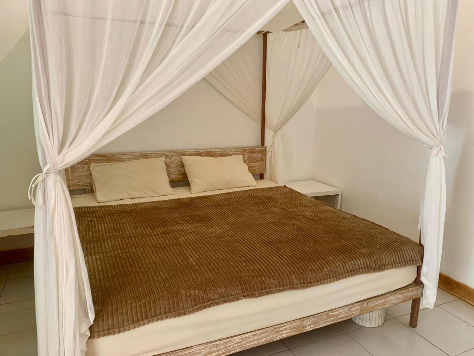 The Village Rua Beach Homestay Esterno foto