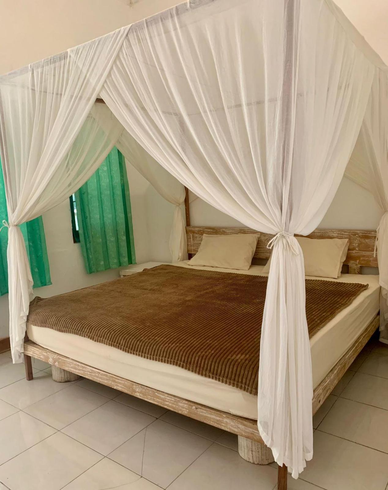 The Village Rua Beach Homestay Esterno foto