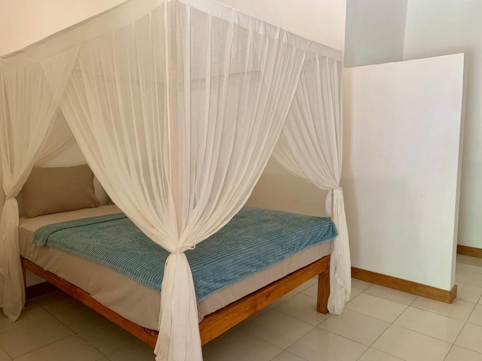 The Village Rua Beach Homestay Esterno foto